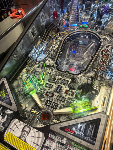 Image of Stern Pinball LOADED The Munsters Premium Black & White Pinball Machine