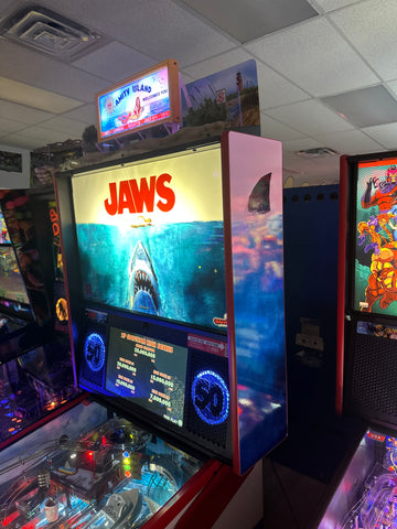 Image of Stern Pinball LOADED Jaws 50th Anniversary Pinball Machine with Stern Topper
