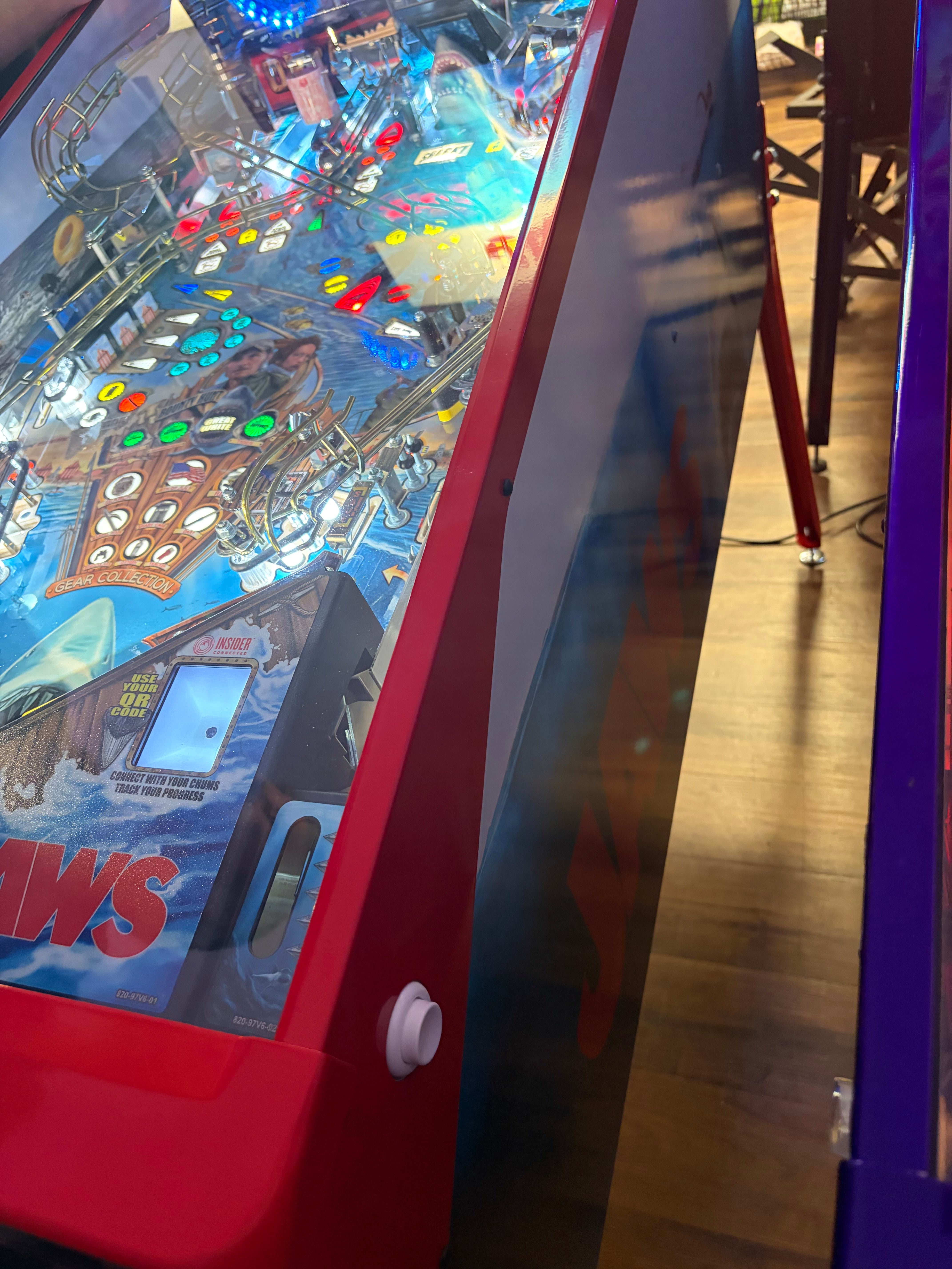 Stern Pinball LOADED Jaws 50th Anniversary Pinball Machine with Stern Topper