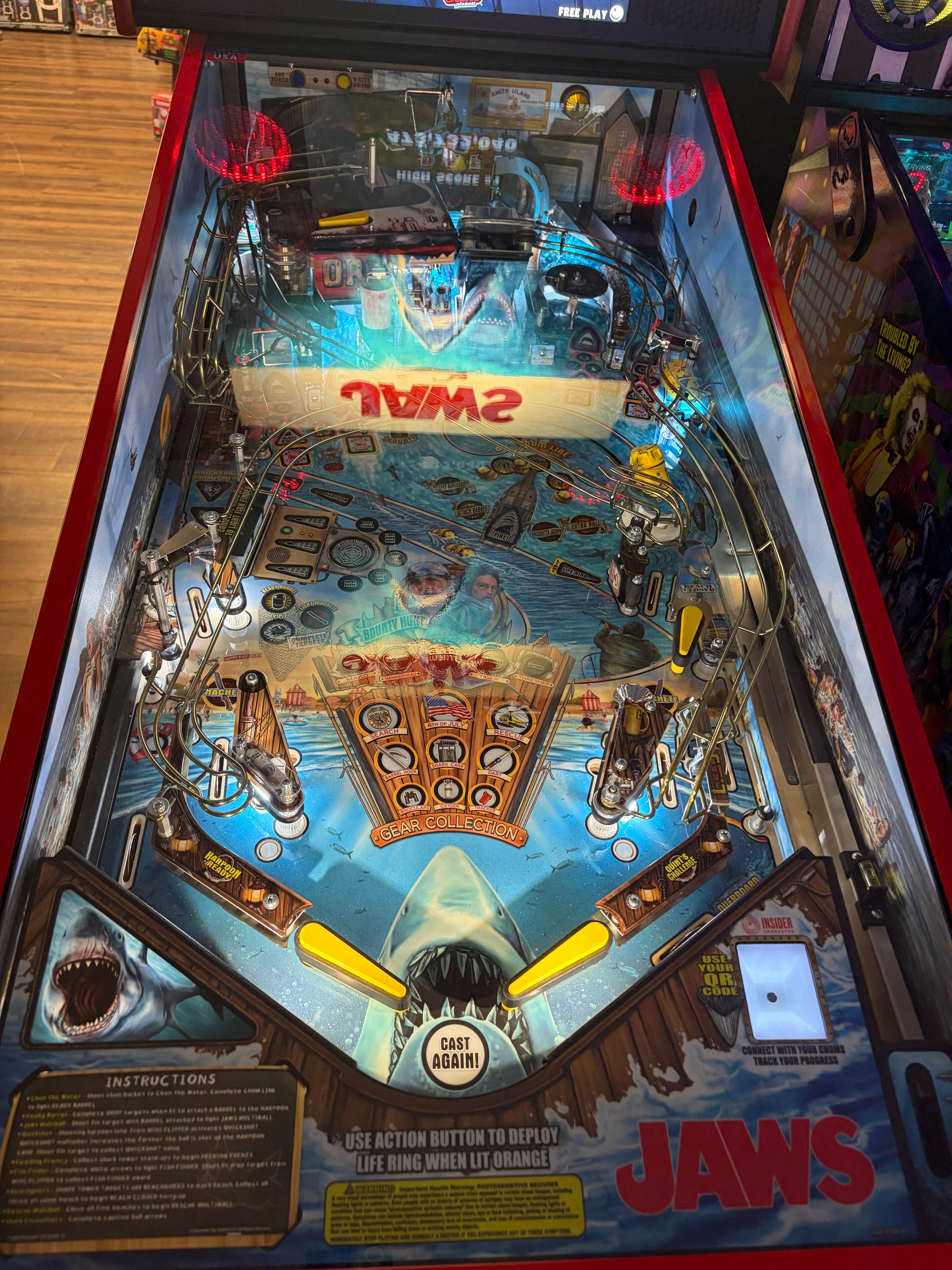 Stern Pinball LOADED Jaws 50th Anniversary Pinball Machine with Stern Topper