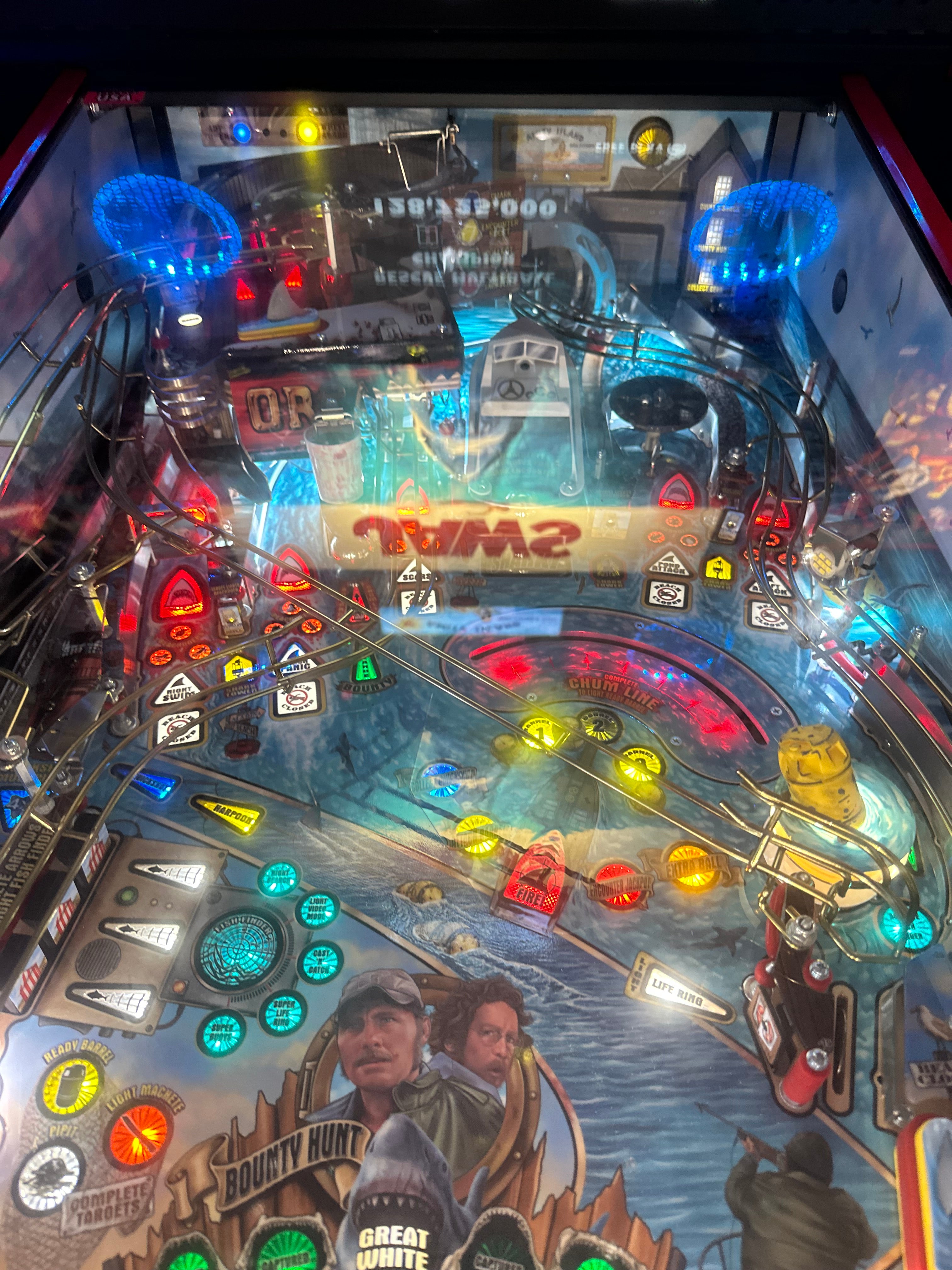Stern Pinball LOADED Jaws 50th Anniversary Pinball Machine with Stern Topper