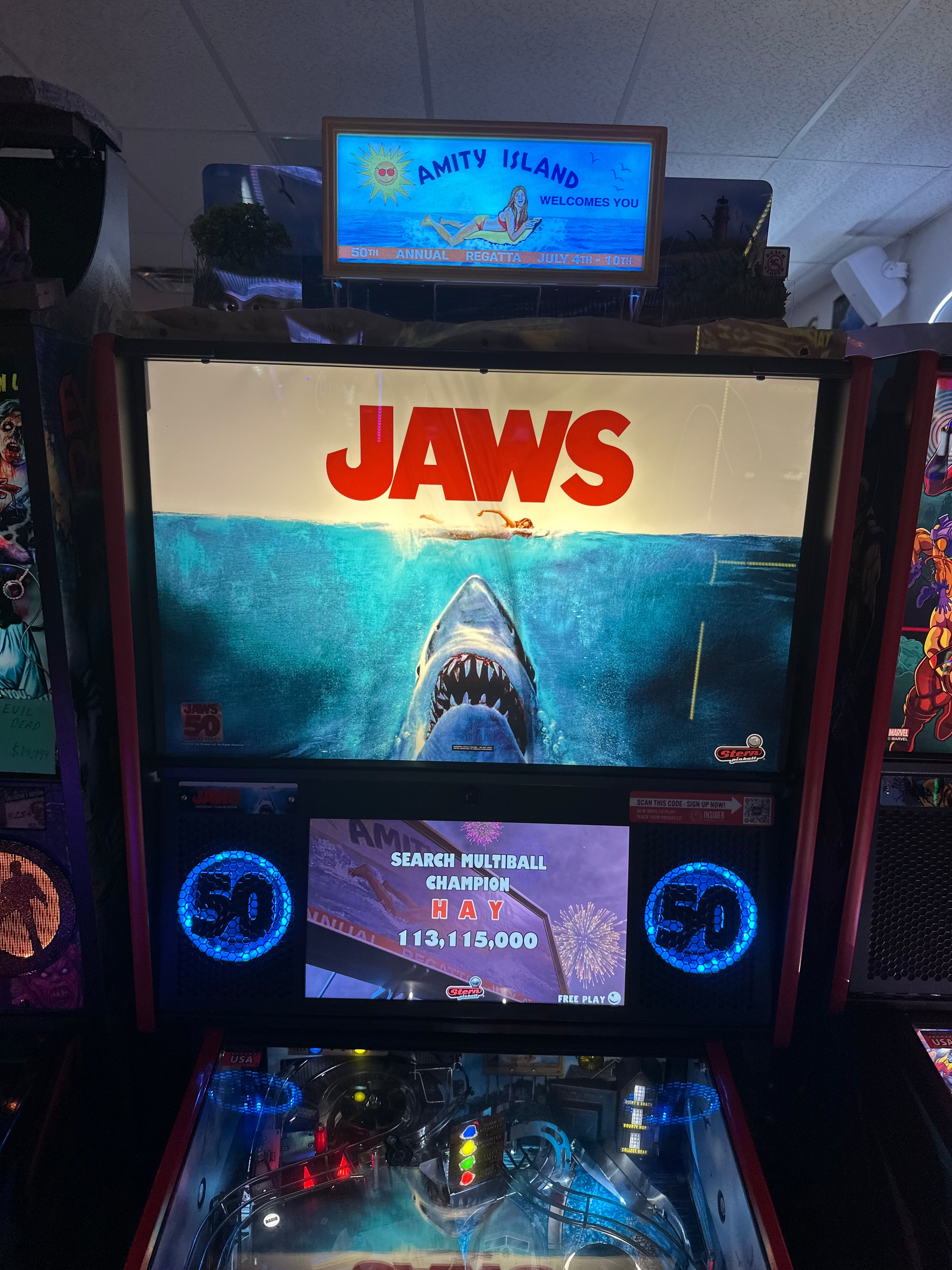 Stern Pinball LOADED Jaws 50th Anniversary Pinball Machine with Stern Topper