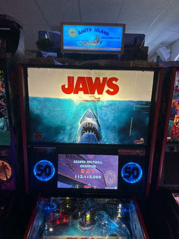 Image of Stern Pinball LOADED Jaws 50th Anniversary Pinball Machine with Stern Topper
